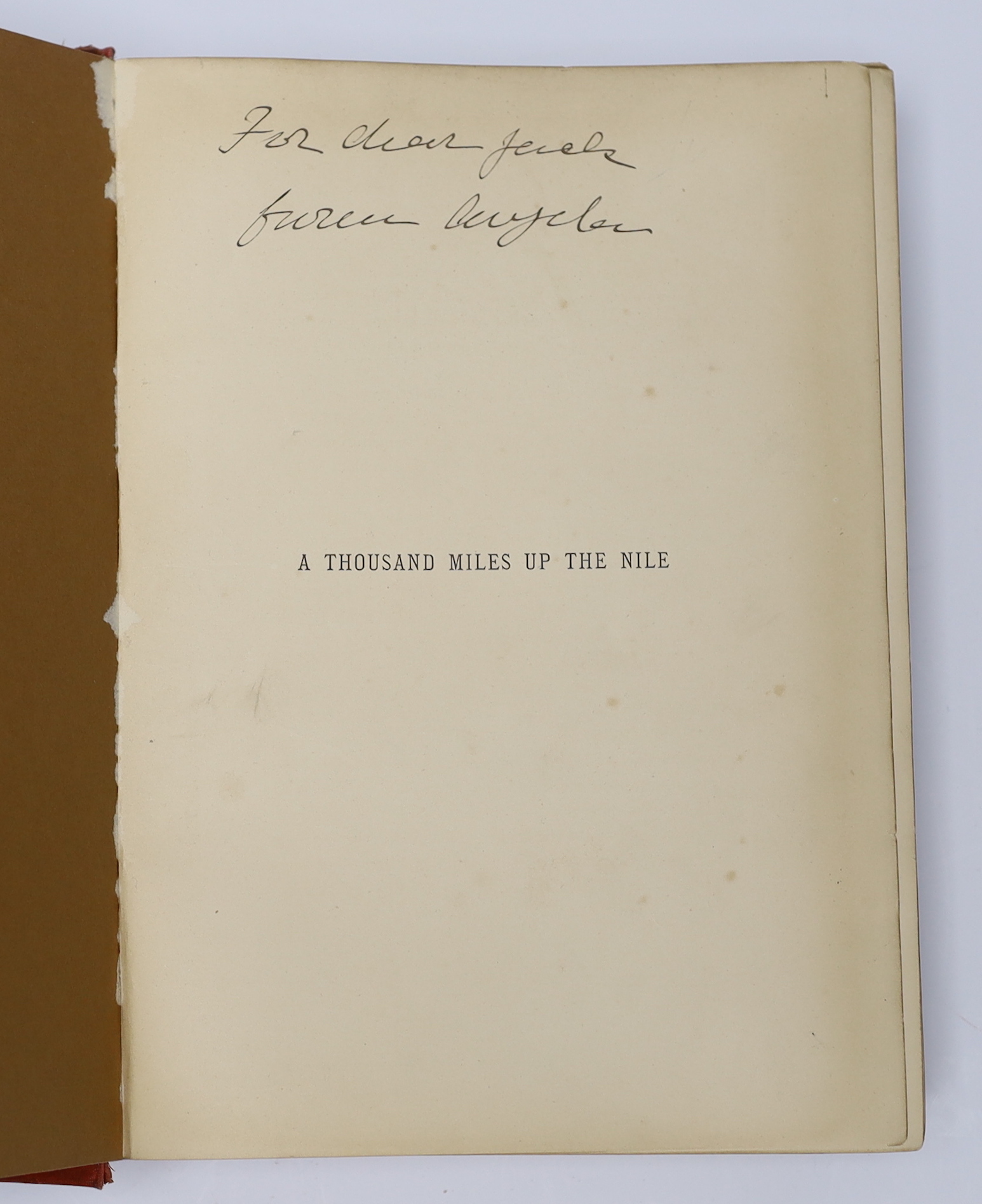 Edwards, Amelia B. A Thousand Miles up the Nile. First Edition. engraved title vignette, 2 folded and coloured maps, 17 wood engraved plates and num. text illus.; publisher's gilt and black pictorial and decorated cloth